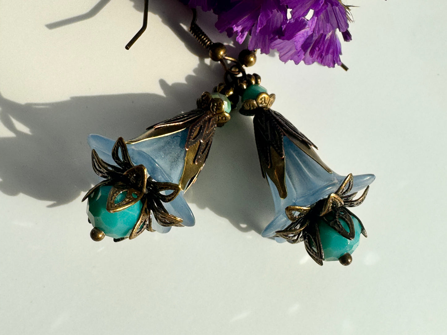 Blue fairies brass earrings