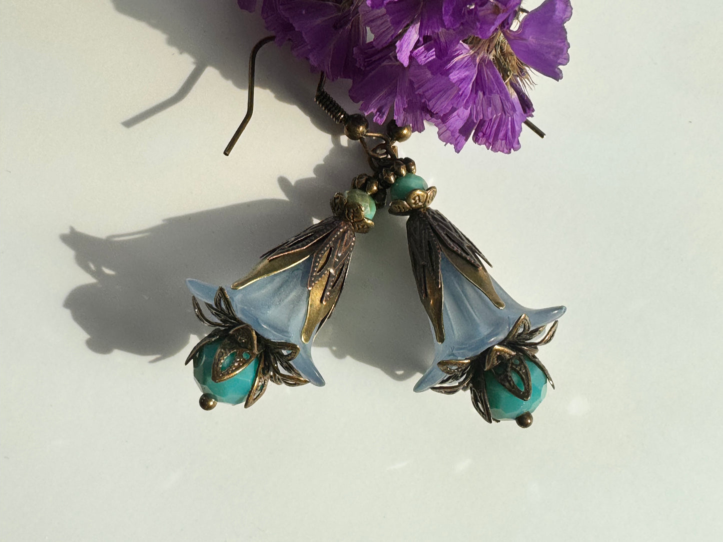 Blue fairies brass earrings