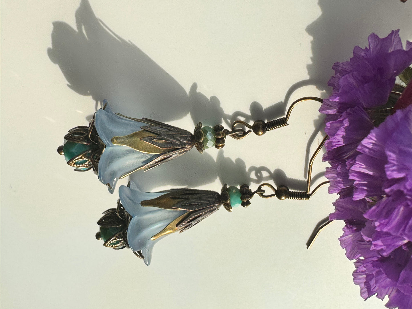 Blue fairies brass earrings
