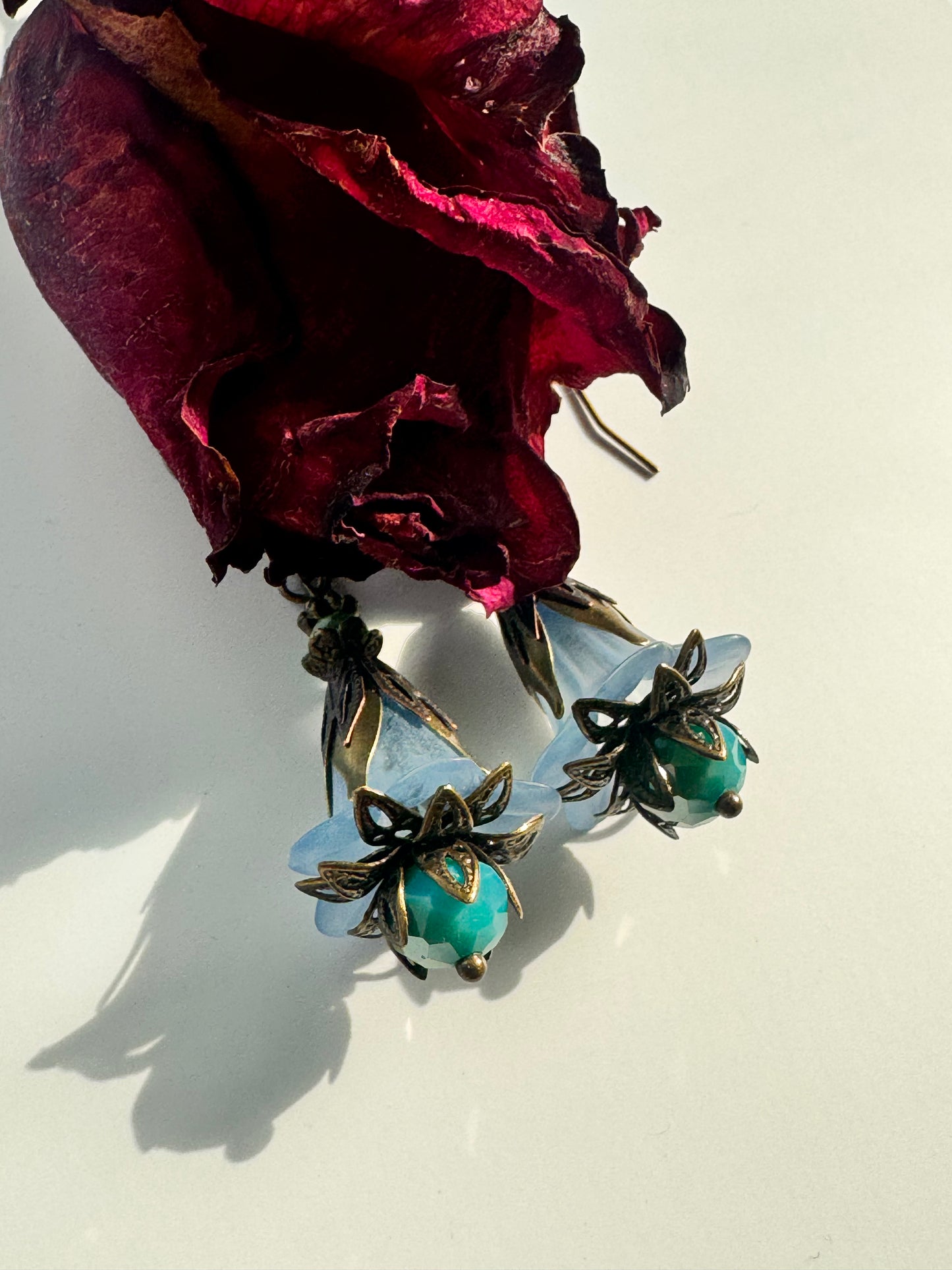 Blue fairies brass earrings