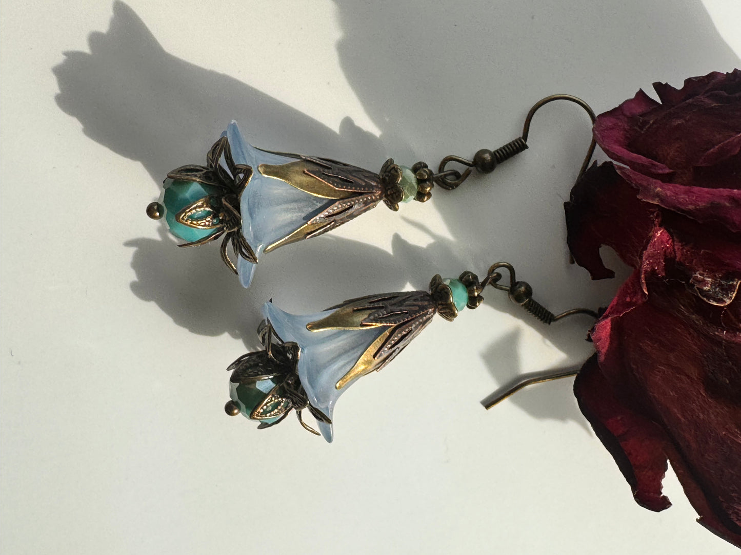 Blue fairies brass earrings